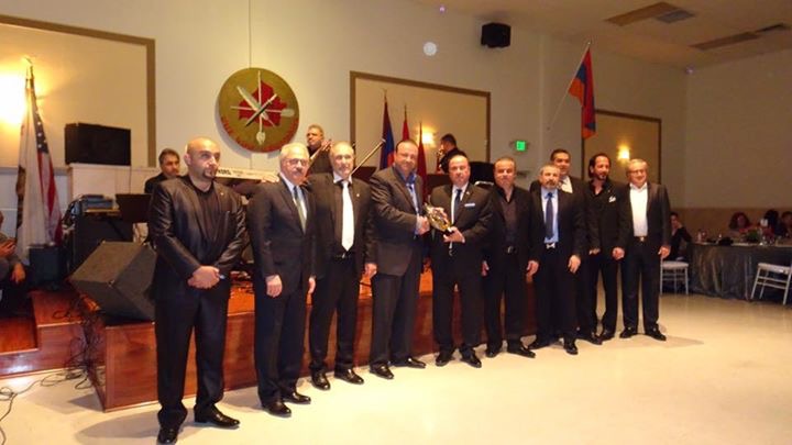 ARF Dro Gomideh leaders and members with benefactor Mike Sarian (center) during Saturday's "With Artsakh" fundraiser