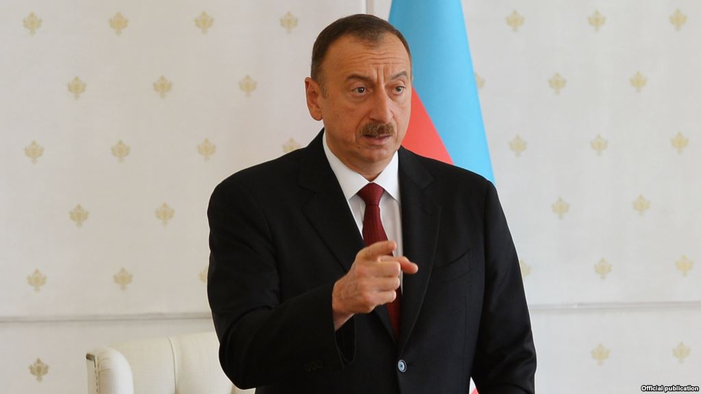 Azeri President Ilham Aliyev speaks at a cabinet meeting in Baku on July 13, 2015 (Source: RFE/RL)