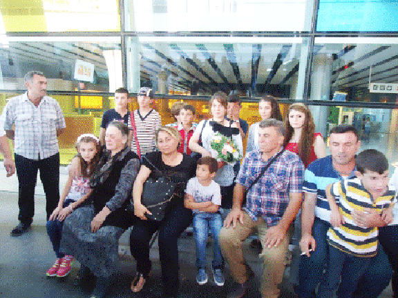 The Tomasian family after having arrived at Yerevan's Zvartnots Airport