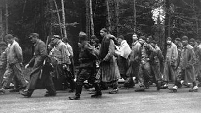 MOBILE HOLOCAUST: Prisoners of Nazi Death Camps marching under the gaze of German guards. Photo from the US Holocaust Memorial Museum.
