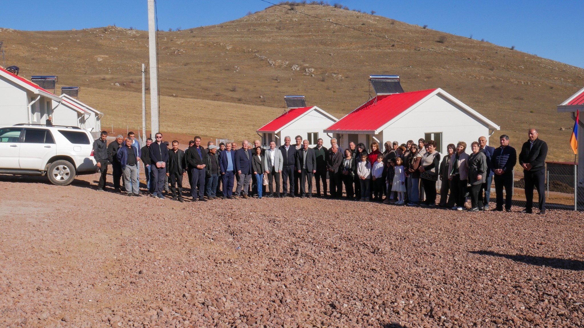 SYUNIK, Armenia - Families from the Martakert region of Artsakh participated in a ribbon-cutting ceremony for their new homes in the village of Svarants, in Armenia’s southern Syunik region. These homes were among the first ten to be completed by the Tufenkian Foundation as part of its Come to Svarants Resettlement program for forcibly displaced